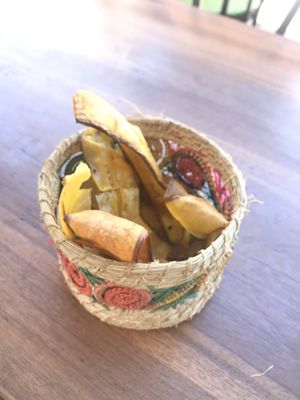 Tasty plantain chips (crisps) that accompany the salad. at Ikaro Cafe in Santa Marta