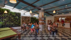 Relaxing indoor atmosphere at Ikaro Cafe in Santa Marta