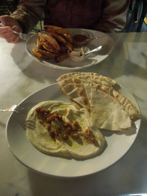 02.16.
Hummus with Pita 8,50€
Potato wedges 7€
both very yummy, especially the dips for the wedges were soo good.
 at Kafe Botanika in San Sebastian