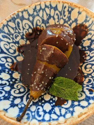 Poached pear with chocolate at Kafe Botanika in San Sebastian