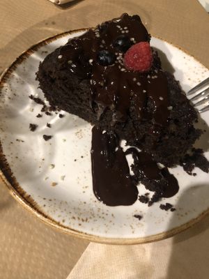 Carob and sweet potato cake slice was huge   at Kafe Botanika in San Sebastian