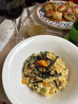 Pumpkin mushroom rice dish (background dish is tempura veggies)  at Kafe Botanika in San Sebastian