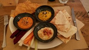 trio of 3 dips: hummus, carrot pate, muhamara at Kafe Botanika in San Sebastian