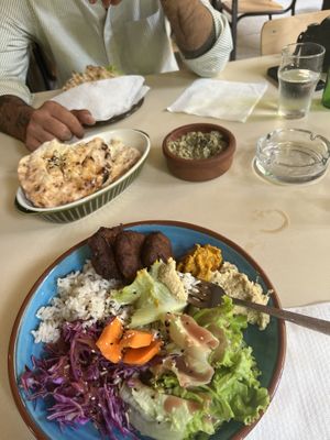 Buddha bowl, babaganoush and burger   at Babaghanoush in Pristina