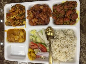 All Vegan Thaali - Potato, Mixed Veggies, Manchurian and Carrots and Peas curries with rice, pickle and salad  at Prem Sweets and Restaurant in Brampton