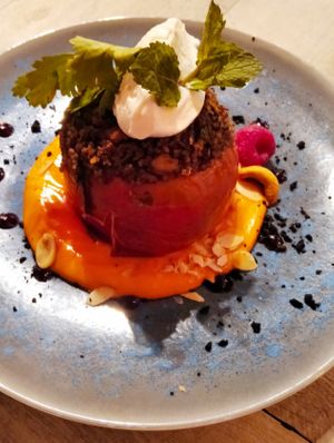 Baked tomato filled with couscous and vegetables at La Isleta de La Vina in Cadiz