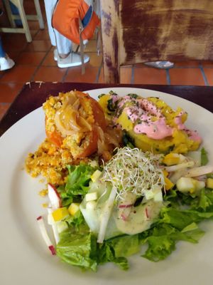 Stuffed tomato, mashed potatoes with beet cream, salad at Prana in Envigado