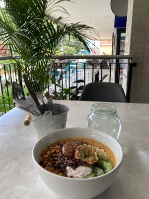 Yellow fruit smoothie bowl at Chana Plant Based in Medellin