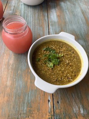 Lentil curry soup and strawberry juice at Chana Plant Based in Medellin