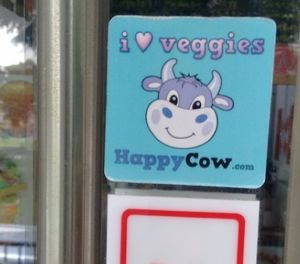 Happy cow!  at Nature's Harvest Cafe in Central Singapore