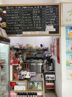 Uncle chef preparing my meal with much love at Nature's Harvest Cafe in Central Singapore