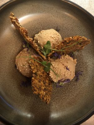 Black garlic hummus and raw crackers  at Al Tiglio Cucina Naturale in Moruzzo