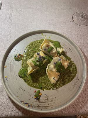 Porcini mushroom tortelloni with pesto and wild garlic sauce  at Al Tiglio Cucina Naturale in Moruzzo