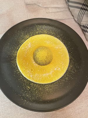 Cashew, dates and coconut mousse, coated with chocolate, with orange tofu sauce  at Al Tiglio Cucina Naturale in Moruzzo