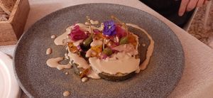 Zucca in Saor - zucca al forno con cipolla, uvetta e capperi at Al Tiglio Cucina Naturale in Moruzzo