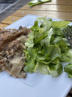 Mushroom lasagna with salad at Mariposa in Nuremberg