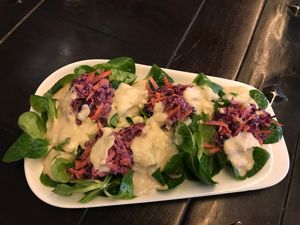 Raw salad with creamy cashew dressing  at Mariposa in Nuremberg