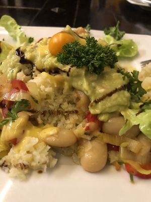 Cauliflower rice with beans and guacamole  at Mariposa in Nuremberg