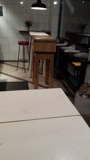 high tables where you can stand on one side and sit on the other at Vegöner in Nuremberg
