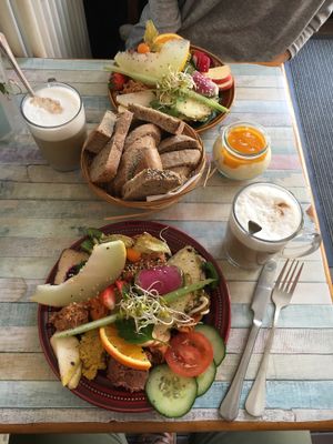 Big and small breakfast plates. Lattes. at Geh Veg in Berlin