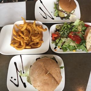 cheese burger, Mexican guacamole burger and small mixed salad  at Valladares in Berlin