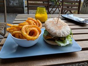 BBQ burger and curly fries at Valladares in Berlin