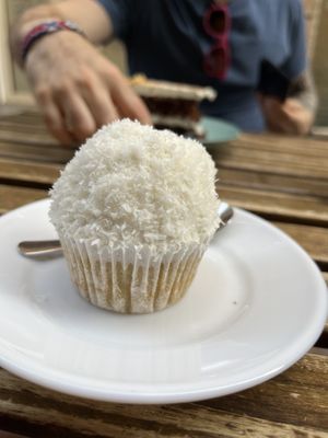 Coco cupcake with whipped cream  at Bohemian Lane in Bilbao