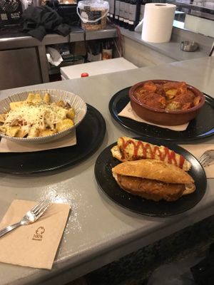 Patatas con baicon y queso, albóndigas en salsa, choripan y tapa de tortilla de patatas at El Oju in Granada