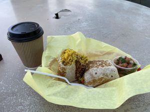 If you look closely you can see 2 of the 3 garbanzos in this burrito that claims to have chana. Also no lentils or sauce. Pretty much 3/4 cup of safron rice in a tortilla for $10   at Appu's Cafe in Long Beach