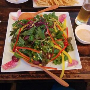 We were so impressed by this gorgeous salad. Purple carrots! Rainbow chard! Watermelon radish! And other goodies... at Hang Out in Tokyo