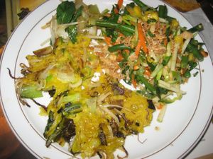 pancakes w “somtam” salad  at Cafe Averechts in Utrecht