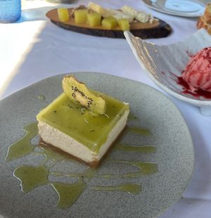 Cashew Cheesecake with Kiwi 🥝 just wow!! And strawberry ice cream 🍓   at Casa Chema in Oviedo