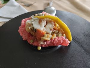 Vegetable salad over crispy rice cookie at Casa Chema in Oviedo