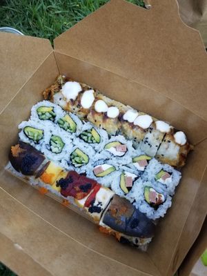 Left to right: Proud Peacock roll, Cucumber Avocado roll, Philadelphia roll, and Hidden Agenda at Shizen Vegan Sushi Bar in San Francisco