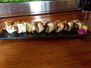 Hidden Agenda Roll (tempura eggplant, bell pepper, zucchini, carrot, yellow onion, fried garlic). at Shizen Vegan Sushi Bar in San Francisco