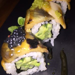 proud peacock: cucumber, avocado, shiitake, eggplant, tofu, pickled mango, roasted peppers, and seaweed pearls. (gluten free) $14.95 at Shizen Vegan Sushi Bar in San Francisco