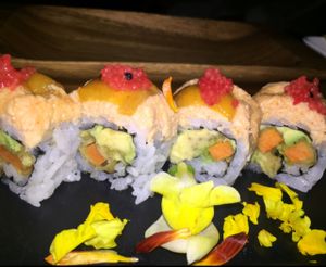 scarlet smile: sweet potato tempura, avocado, spicybean curd, roasted red pepper, and seaweed pearls. $13.80 at Shizen Vegan Sushi Bar in San Francisco