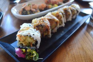 Hidden Agenda Roll (tempura eggplant, bell pepper, zucchini, carrot, yellow onion, fried garlic). at Shizen Vegan Sushi Bar in San Francisco