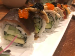 This roll is in the style of a rainbow roll, it’s amazing and lets you try a bunch of the amazing sushi.  at Shizen Vegan Sushi Bar in San Francisco