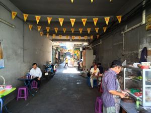 The restaurant is in this alleyway on the righthand side at Jay Vegetarian Restaurant in Bangkok
