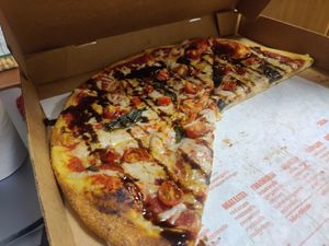 Basil, tomatoes, and balsamic glaze at Blaze Pizza in Gainesville