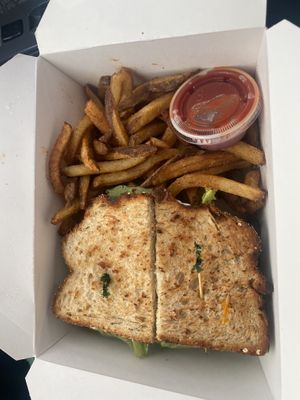 Jamaican Spice TLT with fries   at Quickie Too in Tacoma