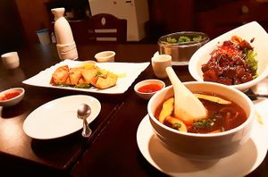 Fried Wantons, Hot and sour soup, Steamed Spinach Shumai and hot Sake.  at Jujube Tree in Astoria