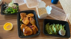 General Tso’s soy protein, veggie dumplings, brown rice and salad  at Jujube Tree in Astoria
