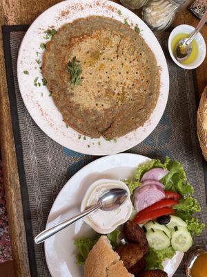 Lentil crepe and falafel plate   at Marrakech Henna Art Cafe in Marrakech