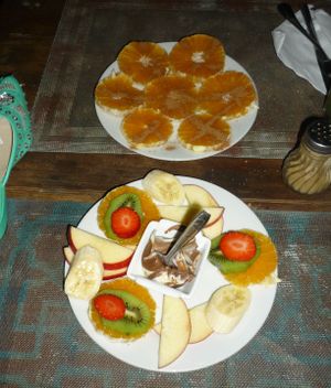 Cinnamon oranges and fruit with chocolate cream at Marrakech Henna Art Cafe in Marrakech