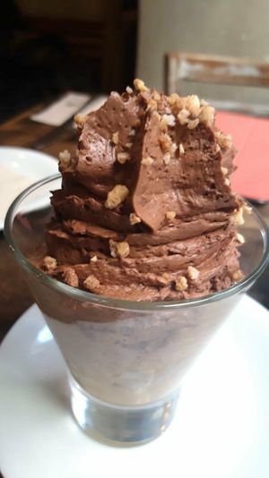 Mousse de chocolate y avellanas con mango at VEGA - Luna in Madrid