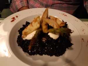 Main / Arroz negro con calamares at VEGA - Luna in Madrid