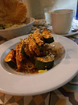 Brochettes Of Heura And Vegetables With Satay Sauce And Japanese Rice Thin Noodles at VEGA - Luna in Madrid