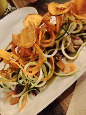 Ceviche made with mushrooms, zoodles and sweet potato crisps at VEGA - Luna in Madrid